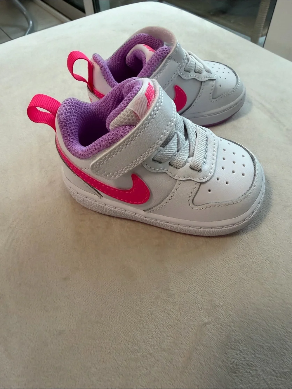 Nike Toddler White Sneakers with Pink & Purple Accents